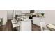 Modern kitchen with stainless steel appliances, granite countertops, and a breakfast bar with seating at 1315 Aura Ln, Lawrenceville, GA 30045