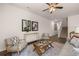 Comfortable living area, featuring contemporary decor, and an open staircase at 1315 Aura Ln, Lawrenceville, GA 30045