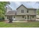 View of backyard with patio and grill, showcasing outdoor space for entertaining and relaxation at 3404 Bodiford Path Path, Powder Springs, GA 30127