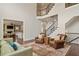 Open foyer leading into the living spaces, featuring a grand staircase and elegant furnishings at 4530 Westgate Dr, Cumming, GA 30040