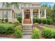 Charming home with a welcoming front porch, beautifully landscaped yard, and a classic design at 4530 Westgate Dr, Cumming, GA 30040