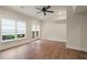 Bright living room with hardwood floors and french doors at 4530 Westgate Dr, Cumming, GA 30040