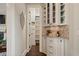 Walk-in pantry with custom shelving and ample storage space at 4530 Westgate Dr, Cumming, GA 30040