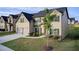 Beautiful two-story home with manicured lawn, two-car garage, and inviting curb appeal at 3746 Okefenokee Rdg, Loganville, GA 30052