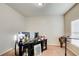 Bright office space with a large window, perfect for remote work and productivity at 3746 Okefenokee Rdg, Loganville, GA 30052