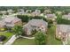 A beautiful brick house with mature trees sits among manicured lawns at 1241 Edgebrook Ln, Snellville, GA 30078