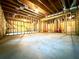 Spacious unfinished basement with exposed wooden framing, offering a blank canvas for personalized design at 1241 Edgebrook Ln, Snellville, GA 30078
