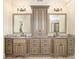 A full bathroom with double sinks, tile floor, and granite countertop at 1241 Edgebrook Ln, Snellville, GA 30078