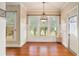 Breakfast nook features large windows with natural light and hardwood floors at 1241 Edgebrook Ln, Snellville, GA 30078