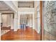 A grand foyer featuring hardwood floors, soaring ceilings, and elegant architectural details at 1241 Edgebrook Ln, Snellville, GA 30078