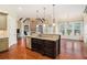 Spacious kitchen island with granite countertops and stainless steel appliances at 1241 Edgebrook Ln, Snellville, GA 30078
