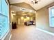 Expansive main bedroom featuring a sitting area, tray ceiling, and ensuite bathroom at 1241 Edgebrook Ln, Snellville, GA 30078