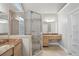 Bright bathroom with glass shower, dual vanities, and tile floor at 220 Chinkapin Sw Cir, South Fulton, GA 30311