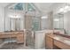 Bright bathroom featuring a glass-enclosed shower and dual vanity sinks at 220 Chinkapin Sw Cir, South Fulton, GA 30311