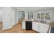 Lovely kitchen featuring granite countertops, white cabinets, and stainless steel appliances at 220 Chinkapin Sw Cir, South Fulton, GA 30311