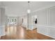 Bright, open living space with hardwood floors, and decorative wall trim at 220 Chinkapin Sw Cir, South Fulton, GA 30311