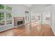 Spacious living area boasts hardwood floors, a fireplace, and ample natural light at 220 Chinkapin Sw Cir, South Fulton, GA 30311