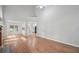 Spacious living room with beautiful hardwood floors and a vaulted ceiling, perfect for entertaining at 220 Chinkapin Sw Cir, South Fulton, GA 30311