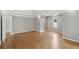 Large main bedroom with hardwood floors, fan, recessed lighting, and ensuite bath access at 220 Chinkapin Sw Cir, South Fulton, GA 30311
