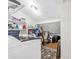 Practical laundry area with storage shelves for easy organization and functionality at 2694 Greentree Se Dr, Marietta, GA 30067