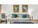 Cozy living room with a comfortable couch, stylish decorations, and an adjacent desk area at 2694 Greentree Se Dr, Marietta, GA 30067