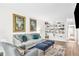 Comfortable living room featuring modern furnishings and a built-in bookcase for storage at 2694 Greentree Se Dr, Marietta, GA 30067