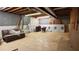 Unfinished basement with tile floor and unfinished wood walls at 4807 Greenway Rd, Norcross, GA 30071