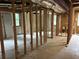 Unfinished basement area with exposed framing and tile floors at 4807 Greenway Rd, Norcross, GA 30071