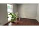Bright and airy bedroom with hardwood floors and natural light from the window at 4807 Greenway Rd, Norcross, GA 30071