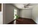 Relaxing bedroom featuring hardwood floors, a ceiling fan, and lots of natural light at 4807 Greenway Rd, Norcross, GA 30071