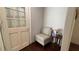 Cozy entryway with cushioned chair, perfect for reading at 4807 Greenway Rd, Norcross, GA 30071