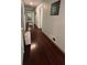 Hallway featuring hardwood floors and an open view to the rest of the home at 4807 Greenway Rd, Norcross, GA 30071