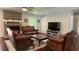 Cozy living room with wood burning fireplace, comfortable seating, and natural light at 4807 Greenway Rd, Norcross, GA 30071