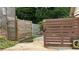 Side yard featuring privacy fence, driveway and corner lot at 4807 Greenway Rd, Norcross, GA 30071