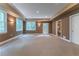Expansive finished basement with recessed lighting and neutral walls and carpet at 3801 Stonebriar Ln, Duluth, GA 30097