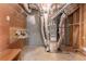 Unfinished basement features an exposed HVAC system with duct work and basic storage options at 3801 Stonebriar Ln, Duluth, GA 30097