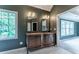 Bright bathroom with double sinks, granite countertop, and ample natural light at 3801 Stonebriar Ln, Duluth, GA 30097