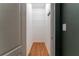 Walk-in closet with hardwood floors, built-in shelving, and plenty of storage space at 3801 Stonebriar Ln, Duluth, GA 30097