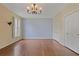 Large bedroom with hardwood floors, large windows, and ensuite bathroom at 460 Chowning Nw Pl, Marietta, GA 30064