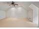 Large bonus room features neutral carpet, ceiling fan and vaulted ceiling is ready for your personal touch at 460 Chowning Nw Pl, Marietta, GA 30064