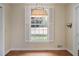 Kitchen area featuring hardwood floors and a window with bright natural light at 460 Chowning Nw Pl, Marietta, GA 30064