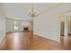 Spacious living room featuring hardwood floors and a charming fireplace at 460 Chowning Nw Pl, Marietta, GA 30064