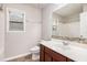 Bathroom with a white vanity, shower, and earth-toned tile at 726 Independence Ln, Acworth, GA 30102