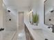 Updated bathroom with double sinks, tiled flooring, and standing shower at 2265 Colony Dr, Canton, GA 30114