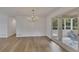 Dining room featuring luxury vinyl floors and access to an outdoor patio at 2265 Colony Dr, Canton, GA 30114