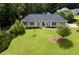 Charming home with lush green lawn and mature trees at 2265 Colony Dr, Canton, GA 30114
