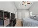 Spacious bedroom with ample closet space, vaulted ceilings, and plush carpeting at 2350 Laurel Pointe Ln, Lawrenceville, GA 30043