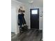 Welcoming entryway features stylish flooring, coat rack, and a modern front door at 2350 Laurel Pointe Ln, Lawrenceville, GA 30043