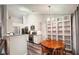 Open kitchen next to eating nook features modern appliances and fixtures at 2350 Laurel Pointe Ln, Lawrenceville, GA 30043