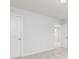 Neutral bedroom with doors and carpet at 3021 Cambridge Mill St, Acworth, GA 30102